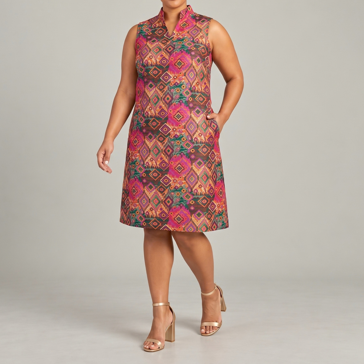 Margaux womens statement dress featuring a tailored shift silhouette and colorful geometric jacquard design.