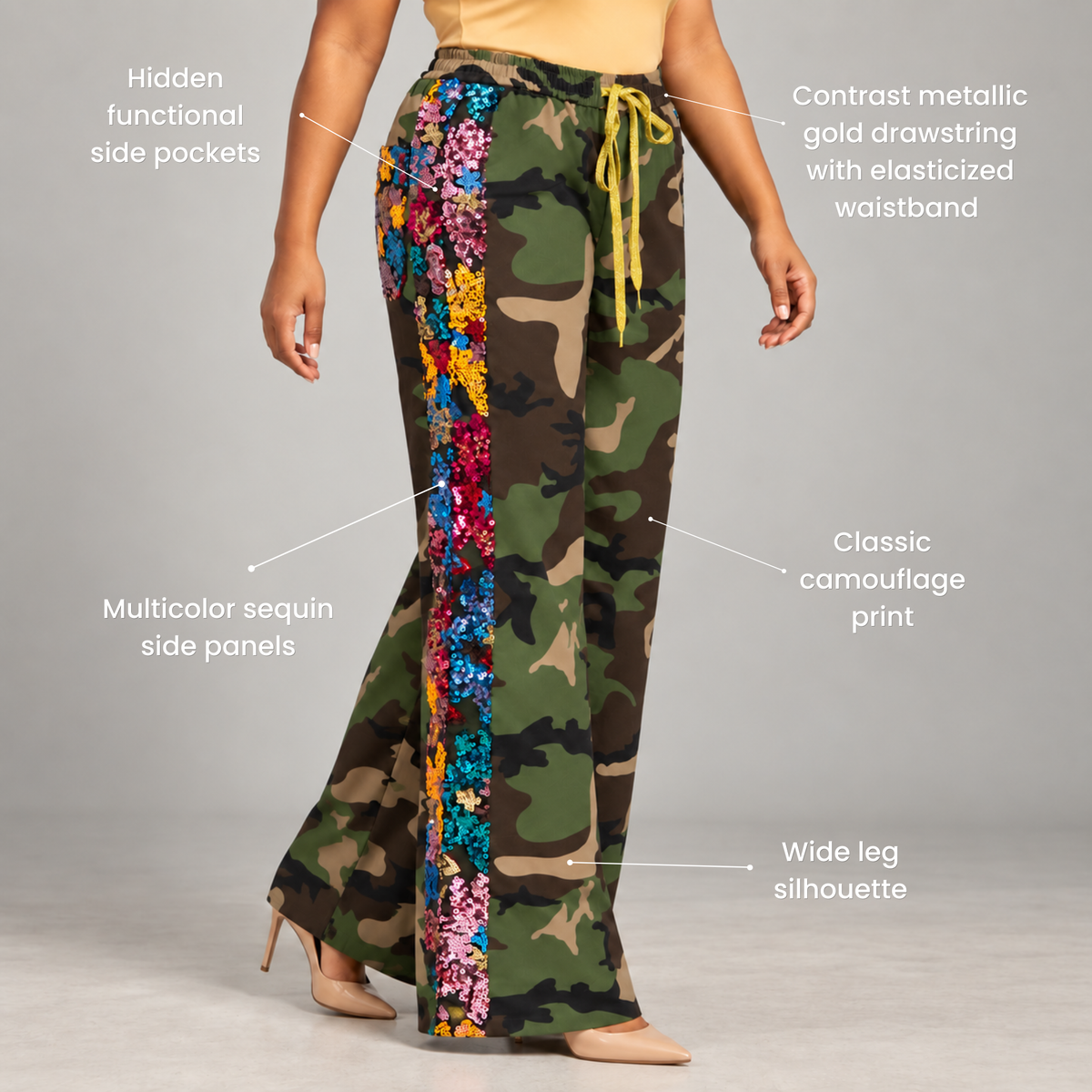 Women's wide leg camouflage track pants with vibrant blue, pink, red and orange sequin detailing.