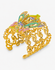 Miss Beasley Cuff Crystallique featuring a jeweled beetle centerpiece surrounded by ornate Gold tone finish filigree.