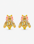 Miss Beasley Crystallique statement earrings shown on ear with sparkling wings and pastel accents.