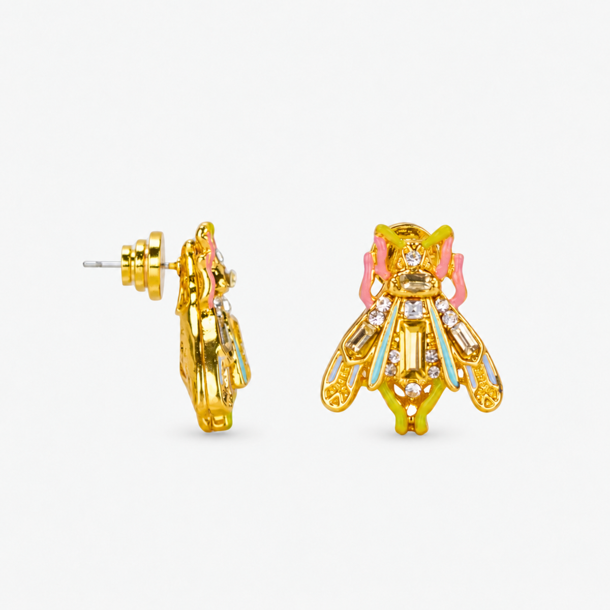 Miss Beasley Crystallique statement earrings shown on ear with sparkling wings and pastel accents.