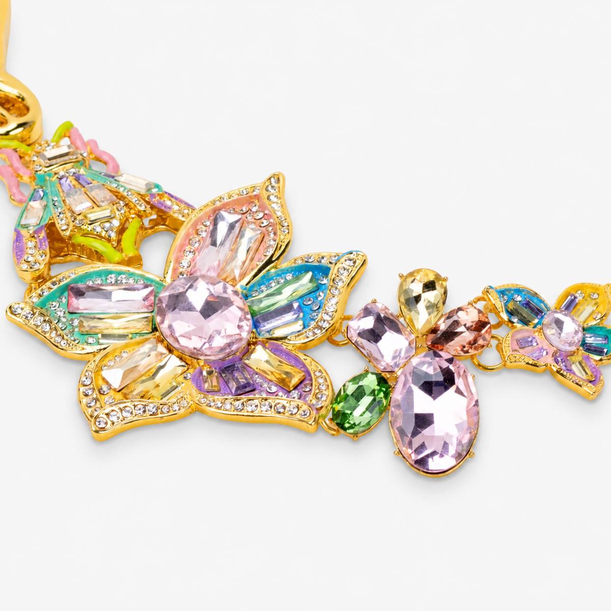 Close-up of Miss Beasley Crystallique Necklace showing dimensional flowers, sparkling beetles and Gold tone finish accents.