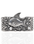 Antiqued silver open cuff bracelet featuring a sculpted fish, coral inspired textures, luminous pearl accents, and intricate ocean detailing.