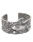 Antiqued silver open cuff bracelet featuring a sculpted fish, coral inspired textures, luminous pearl accents, and intricate ocean detailing.