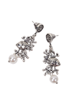 Antiqued silver fish dangle earrings featuring coral inspired detailing, luminous pearl drops, and sculptural ocean inspired elements.