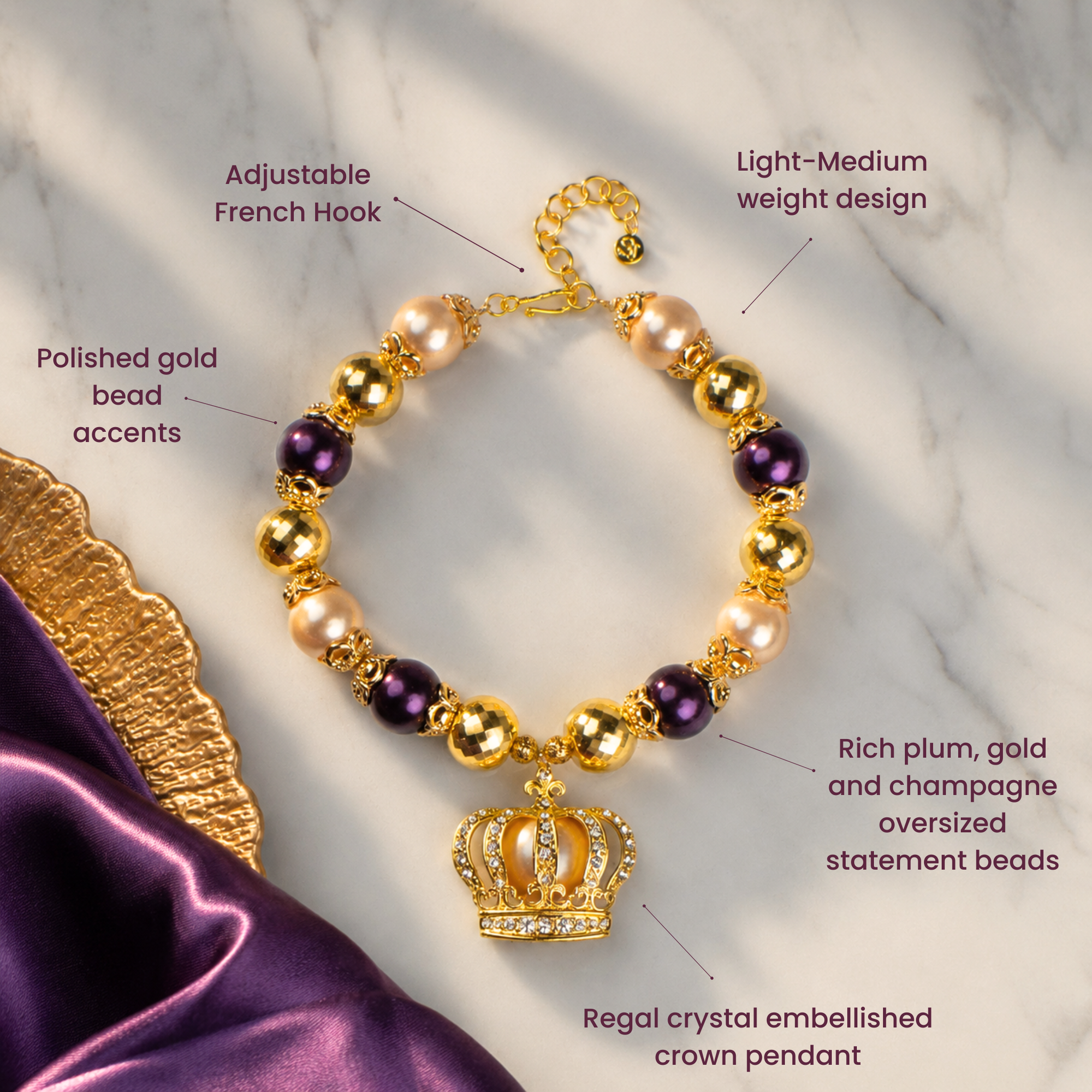 Reign statement necklace with oversized champagne pearls, plum beads, faceted gold beads and crown pendant.