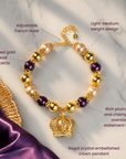 Reign statement necklace with oversized champagne pearls, plum beads, faceted gold beads and crown pendant.