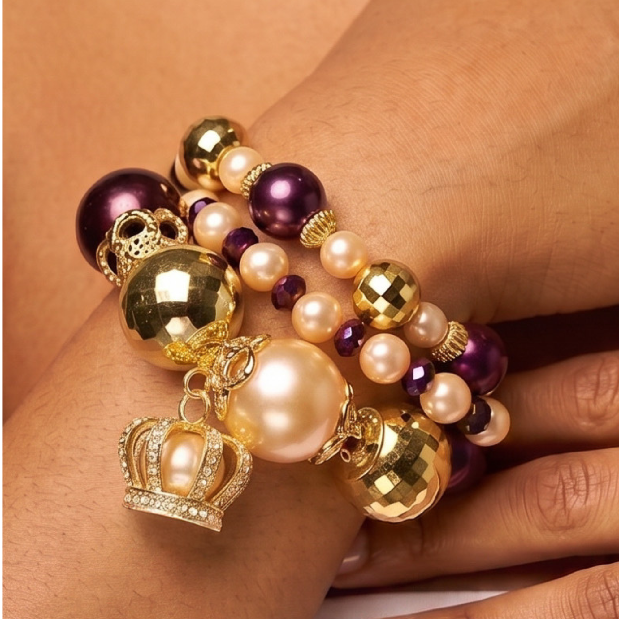 Purple and champagne pearl bracelet stack featuring three coordinating stretch bracelet designs.