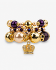 Reign Champagne Pearl 3pc Stretch Charm Bracelet Stack with purple, champagne and faceted gold beads.