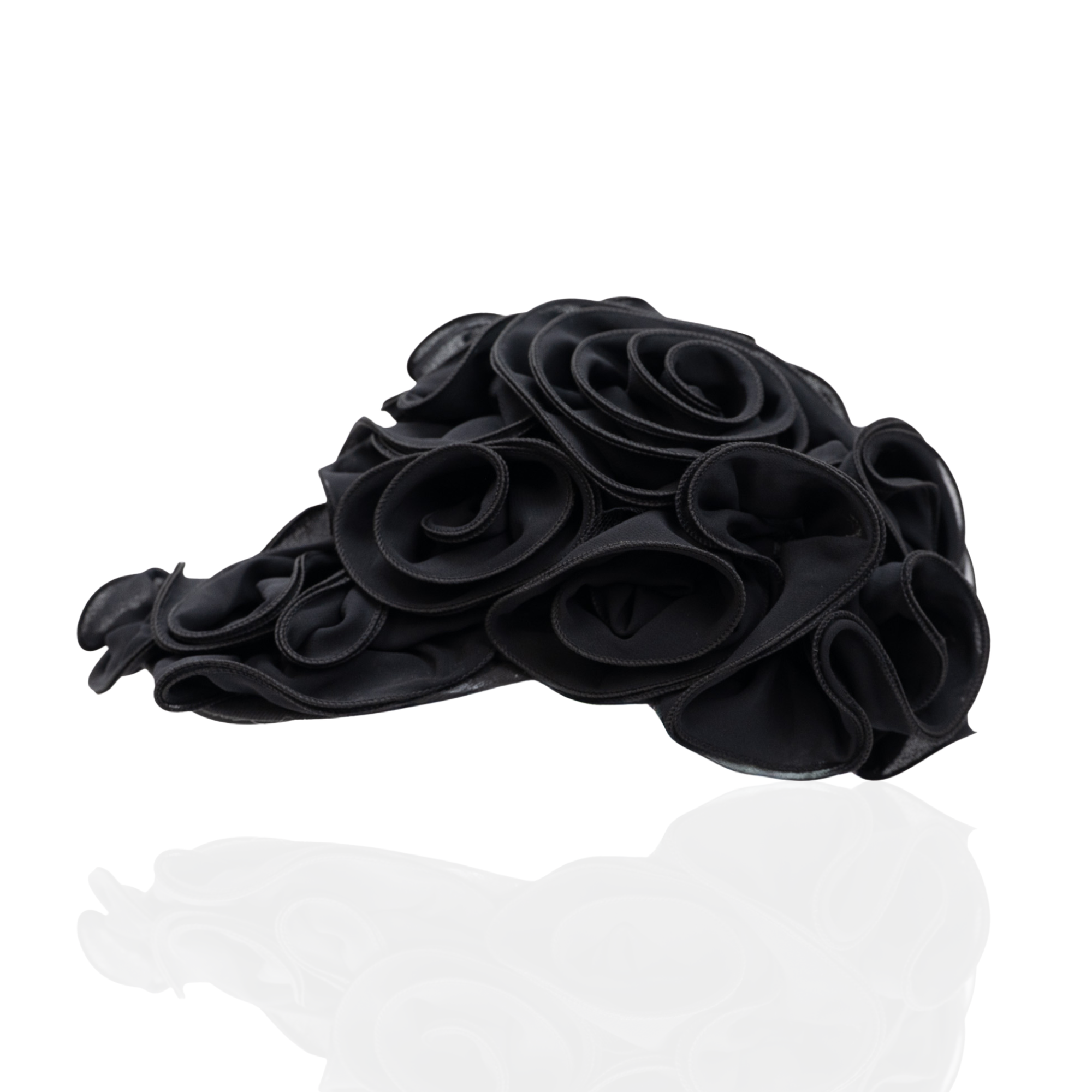 Black chiffon rosette statement cap featuring handcrafted sculptural floral detailing by Sassy Jones.
