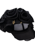 Black chiffon rosette statement cap featuring handcrafted sculptural floral detailing by Sassy Jones.