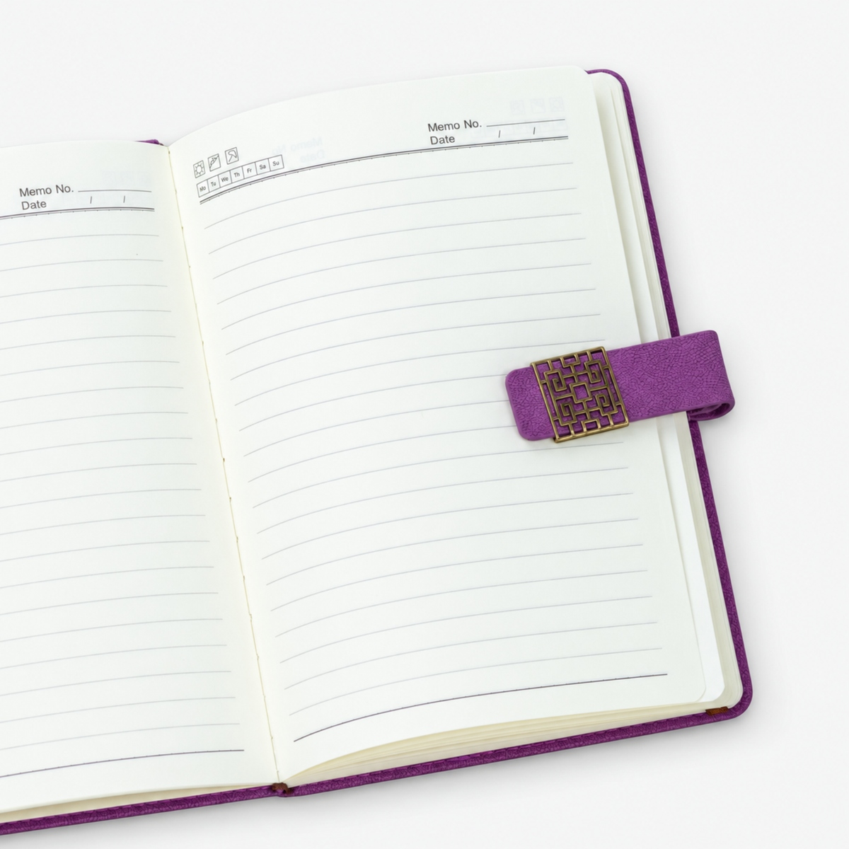 Purple affirmation journal featuring white script lettering, decorative gold colored clasp and coordinating pink pens.