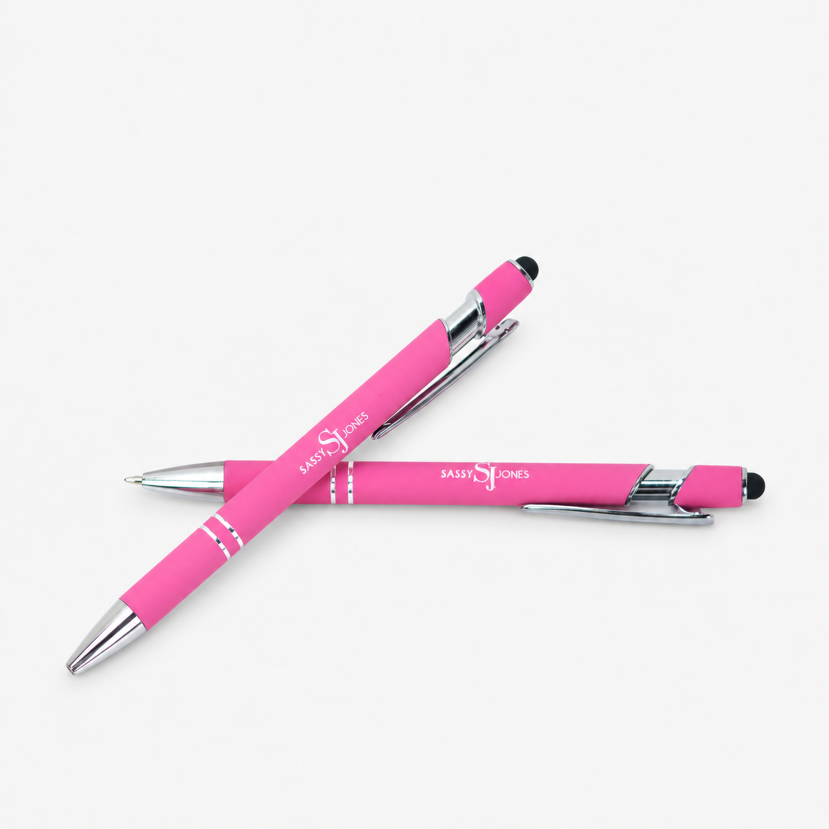 Complimentary Bloom &amp; Believe Trio free with qualifying $249 purchase featuring a purple journal and two pink Sassy Jones pens.