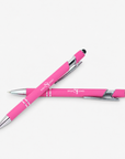 Complimentary Bloom & Believe Trio free with qualifying $249 purchase featuring a purple journal and two pink Sassy Jones pens.