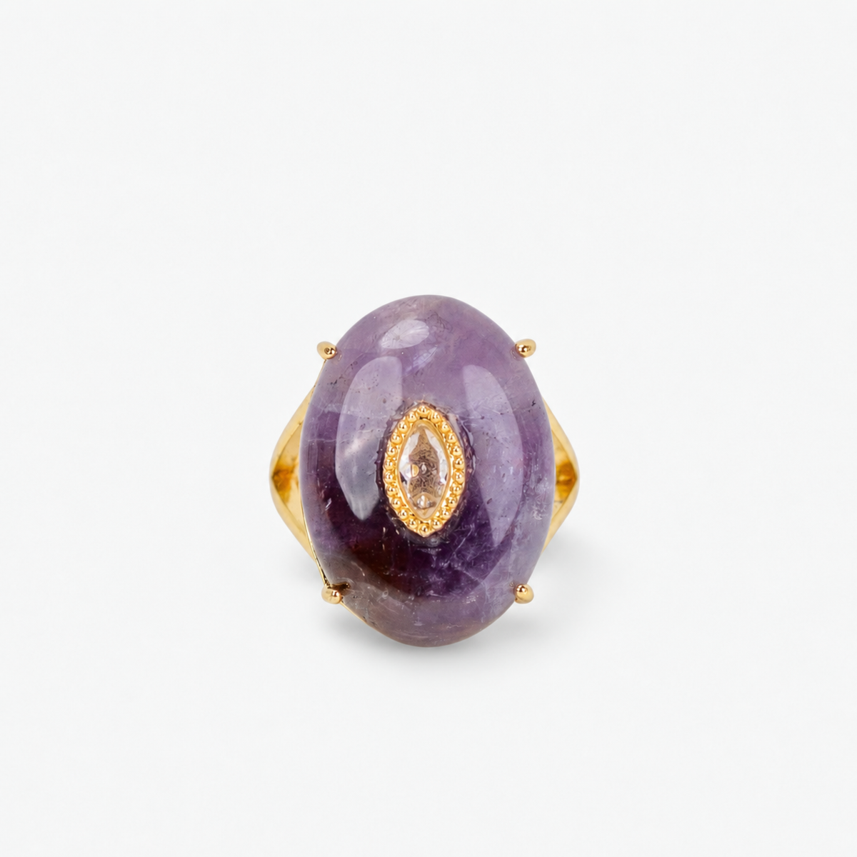 Samira Natural Stone Ring in Purple featuring an oversized smooth purple stone with a luminous center accent.