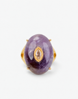 Samira Natural Stone Ring in Purple featuring an oversized smooth purple stone with a luminous center accent.