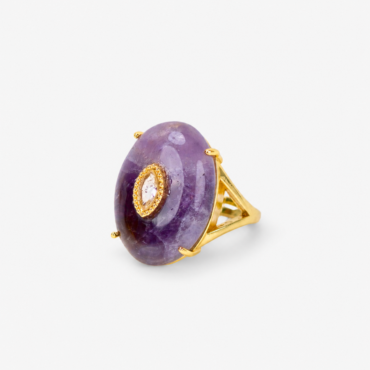 Sassy Jones Samira Purple ring featuring an oversized violet stone in a sculptural gold setting.