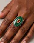 Sassy Jones Samira Malachite ring featuring a sculptural green stone with dramatic dark banding.