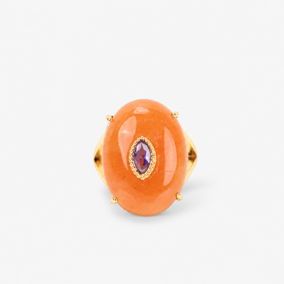 Samira Natural Stone Ring in Orange featuring an oversized smooth orange stone with purple center accent.