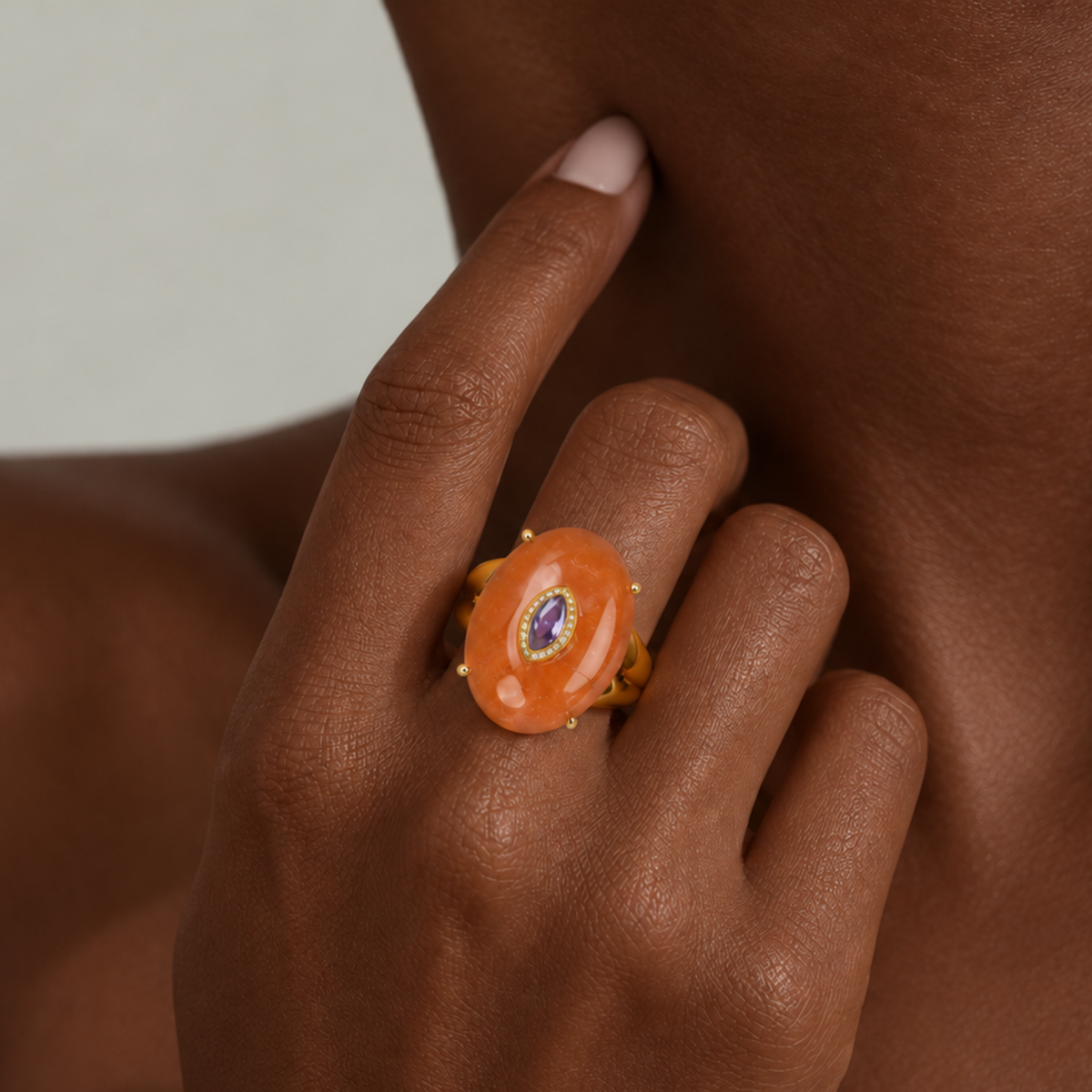 Sassy Jones Samira Orange ring featuring an oversized natural stone silhouette in a sculptural gold setting.