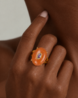 Sassy Jones Samira Orange ring featuring an oversized natural stone silhouette in a sculptural gold setting.