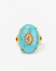 Samira Natural Stone Ring in Teal featuring an oversized blue green stone with distinctive dark veining.