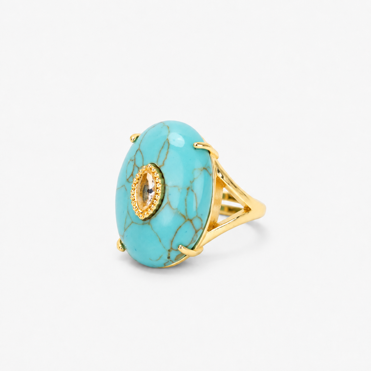 Teal statement ring featuring a smooth veined stone, petite center accent and Gold tone finish.