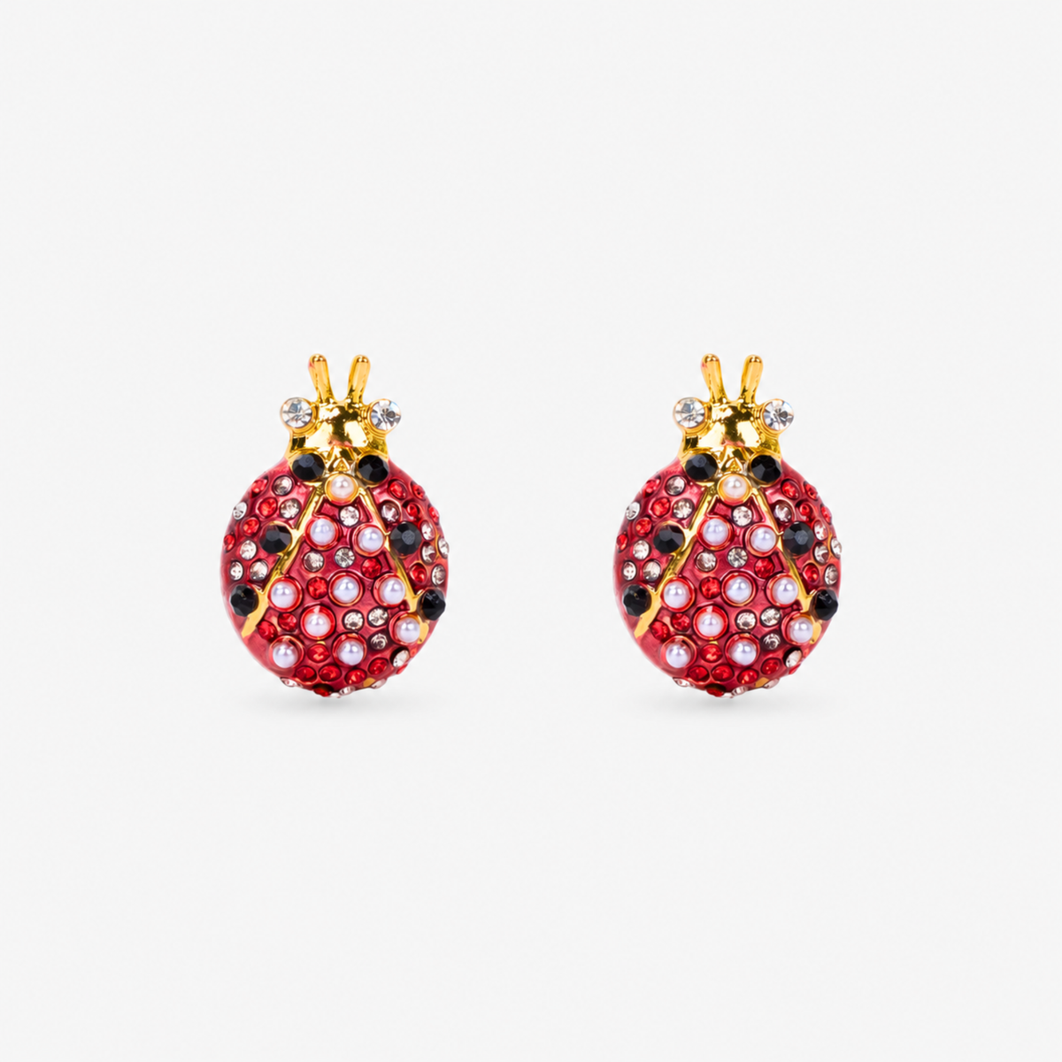 Scarlette Dainty Pearl Studs featuring red ladybugs embellished with petite pearls, crystals and black accents.