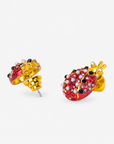 On model view of Scarlette Ladybug Stud Earring featuring red enamel, pearl details and Gold tone finish.