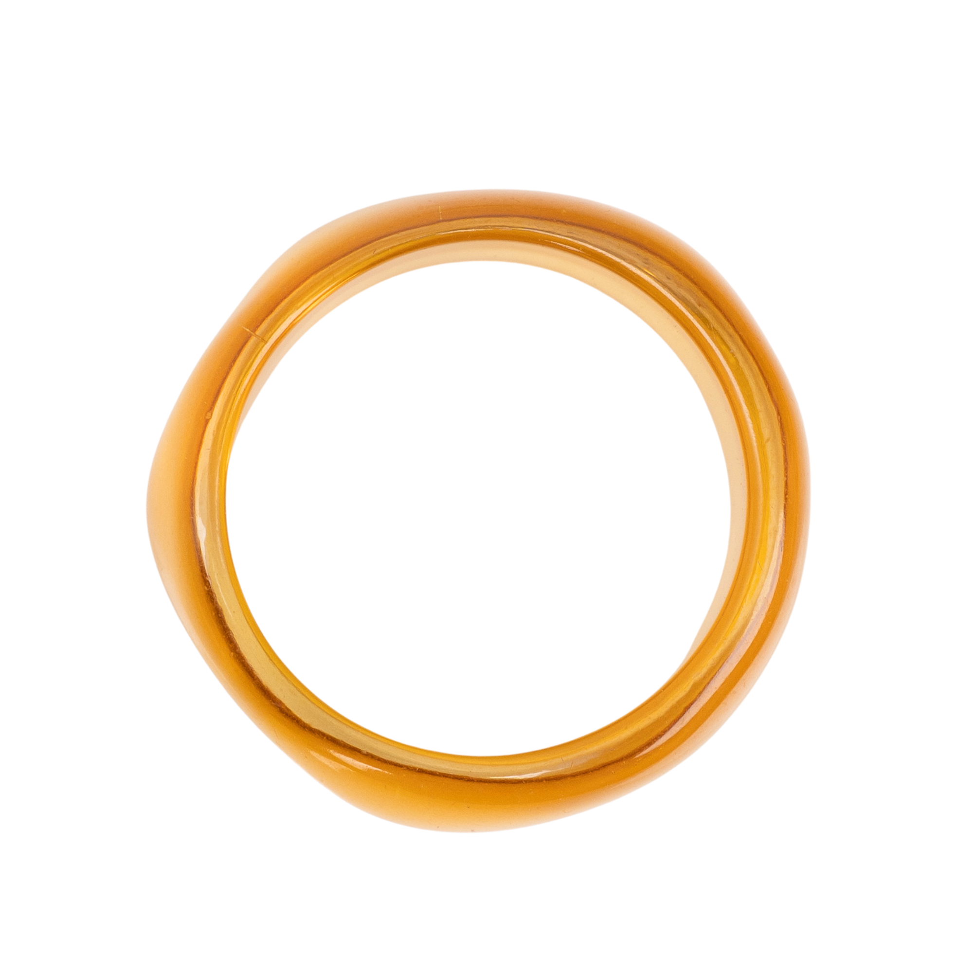 Glossy translucent golden yellow statement bangle bracelet with sculptural rounded silhouette by Sassy Jones.