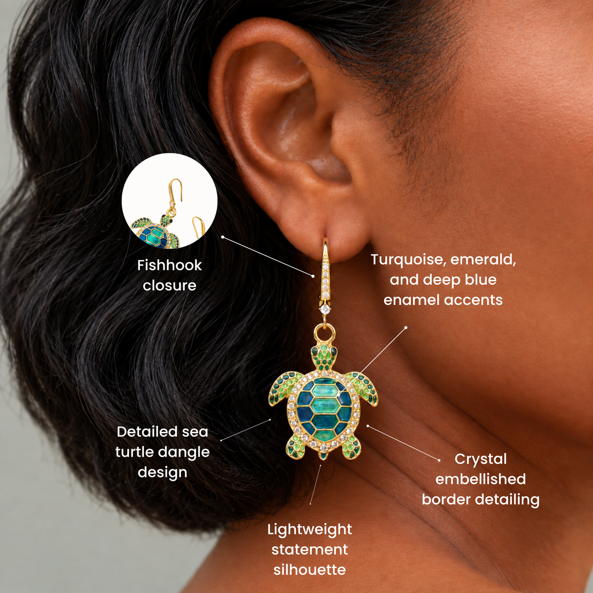 Colorful sea turtle dangle earrings featuring blue and green enamel detailing with a gleaming gold finish.