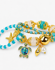 Soleia Sea Turtle 3pc Chunky Stack featuring turquoise, ivory, and gold beads with coastal charms.