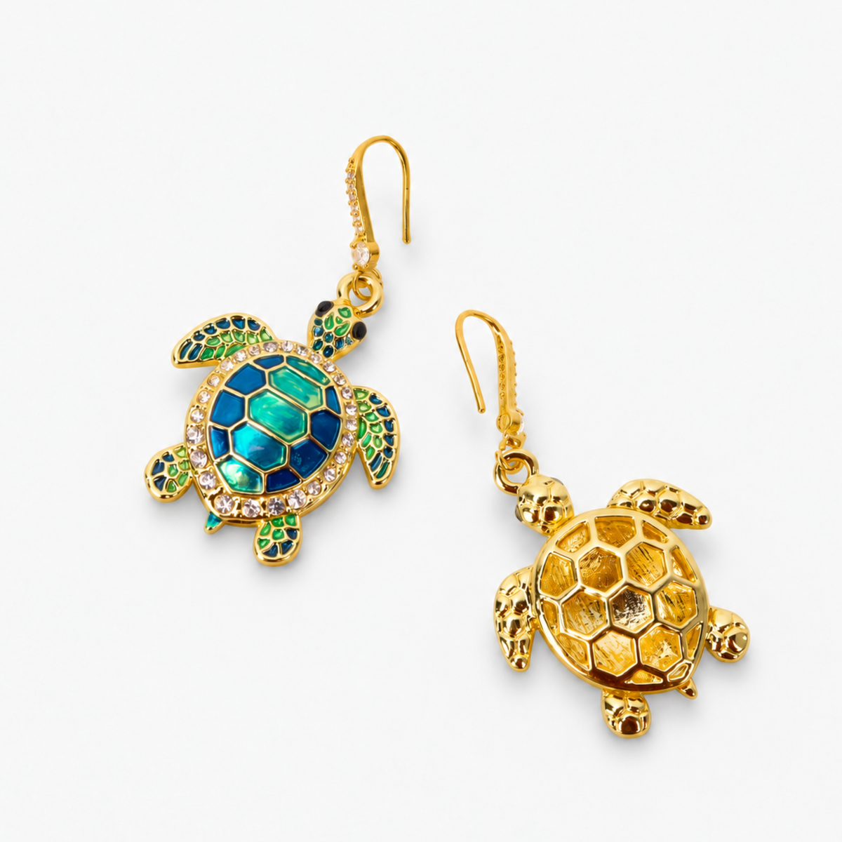 Sassy Jones Soleia statement earrings featuring jeweled sea turtle pendants suspended from crystal lined drops.