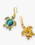 Sassy Jones Soleia statement earrings featuring jeweled sea turtle pendants suspended from crystal lined drops.