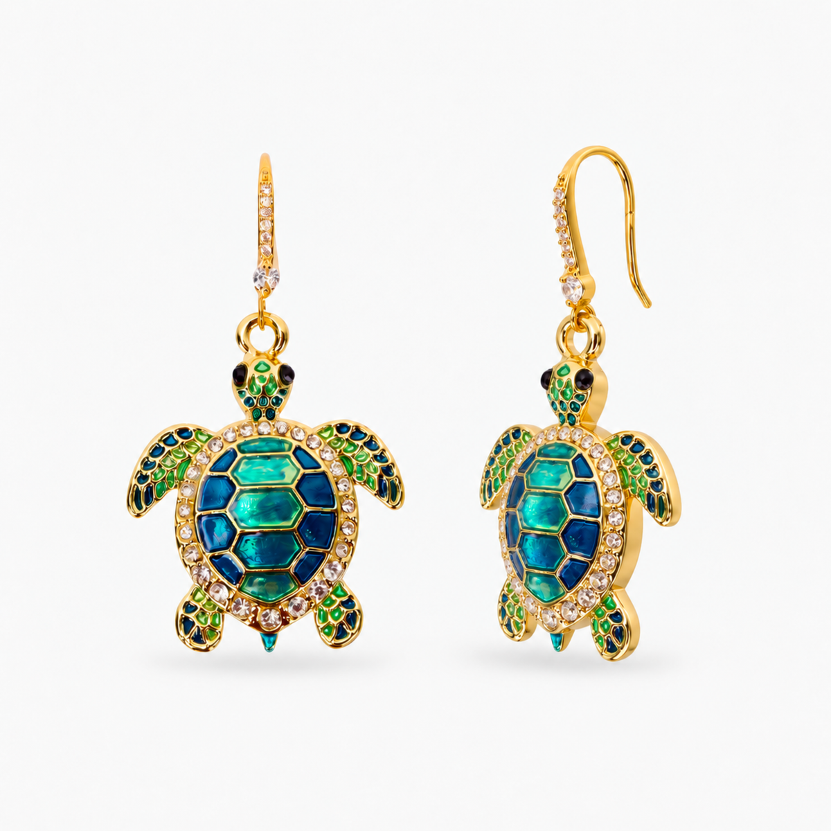 Sassy Jones Soleia statement earrings featuring jeweled sea turtle pendants suspended from crystal lined drops.