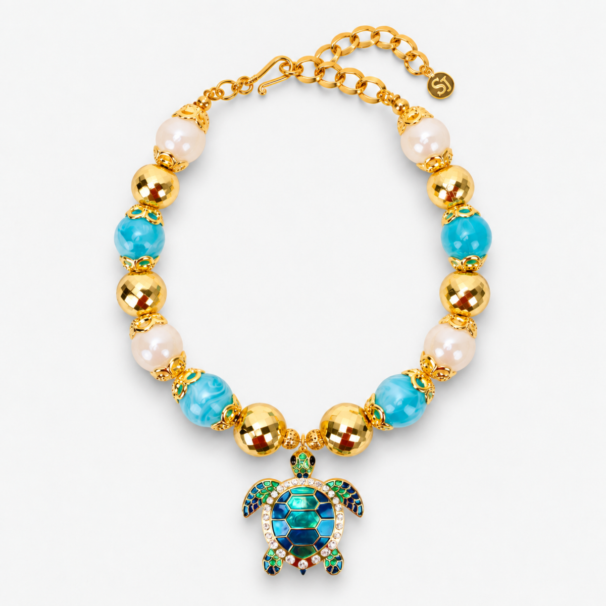Chunky coastal statement necklace featuring oversized beads and a blue and green enamel sea turtle pendant.