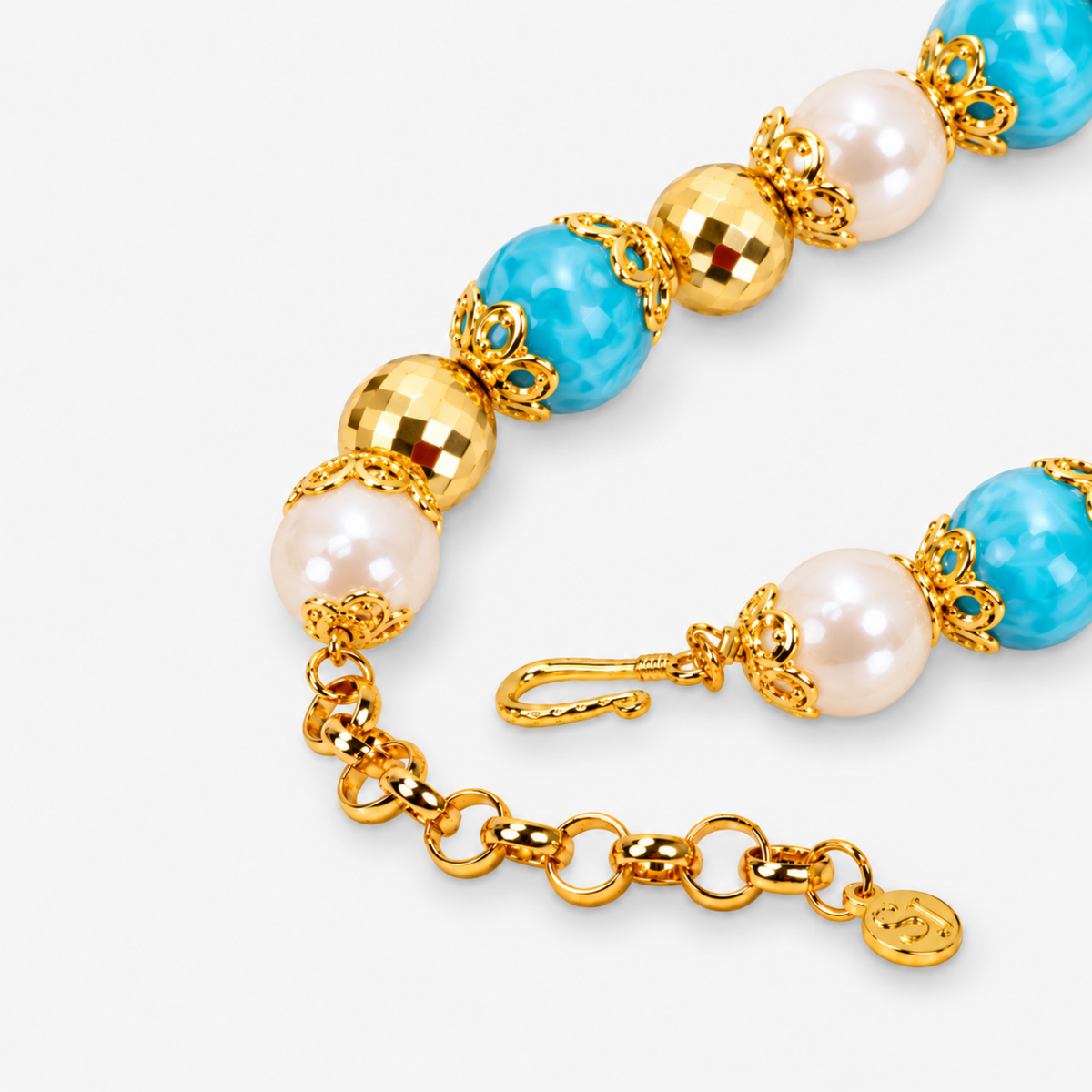 Chunky coastal statement necklace featuring oversized beads and a blue and green enamel sea turtle pendant.