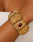 Sassy Jones Soraya Luxe Bracelet featuring dimensional brown and amber details with allover crystal embellishment.