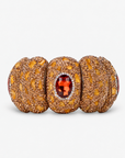 Soraya Luxe Stretch Bracelet in Amber featuring oversized sculptural segments covered in sparkling crystal accents.