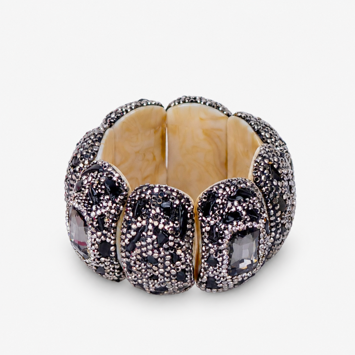Black statement stretch bracelet featuring a large faceted onyx colored centerpiece surrounded by shimmering crystals.