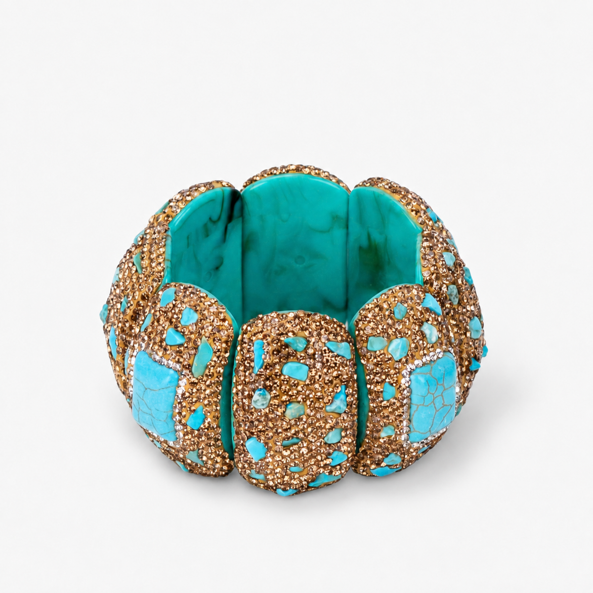Teal statement stretch bracelet featuring a large veined blue green centerpiece surrounded by sparkling crystals.
