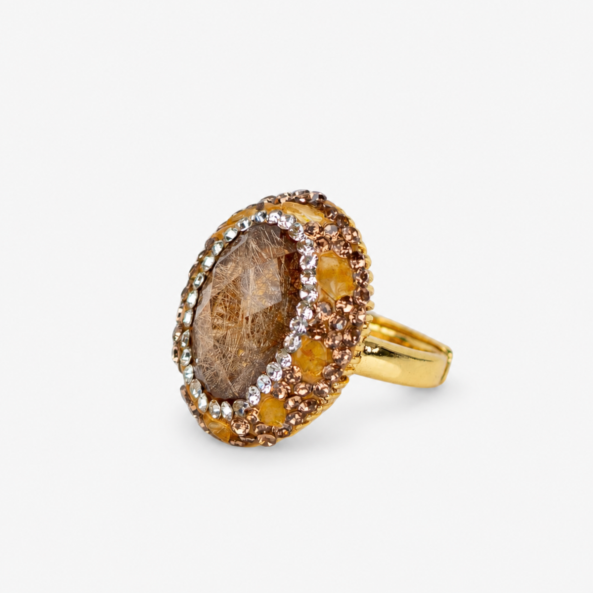Amber statement ring featuring a textured brown centerpiece with layered crystal and Gold tone finish detailing.