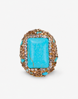 Soraya Luxe Ring in Teal featuring an oversized blue green stone surrounded by sparkling crystal accents.