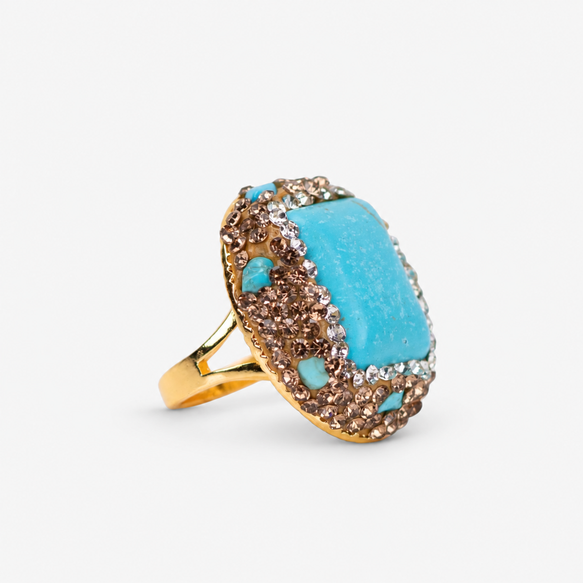 Teal statement ring featuring a veined blue green centerpiece with textured Gold tone finish detailing.