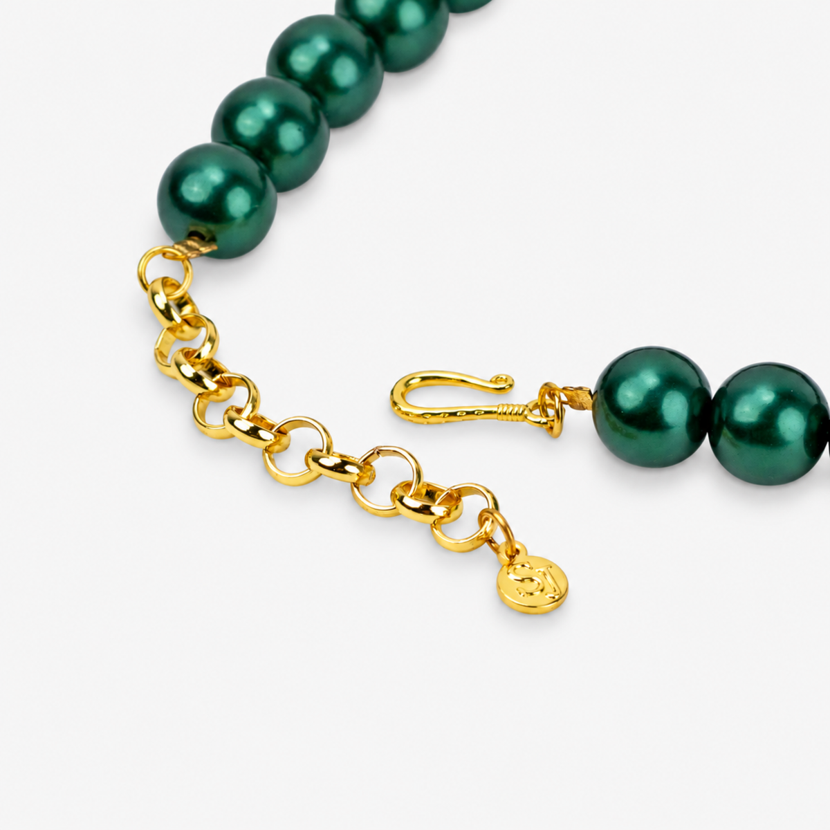 Vintage inspired necktie necklace featuring an olive green striped tie, emerald colored pearls and sparkling multicolor accents.
