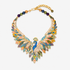 Victoriana Prissy Peacock Necklace featuring a blue peacock surrounded by layered multicolor enamel feathers.
