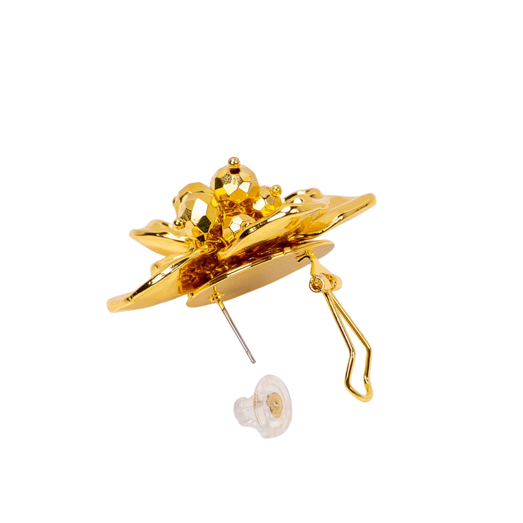 18k gold sculptural floral statement earrings inspired by wisteria blossoms with layered petals and faceted gold center worn on a woman’s ear