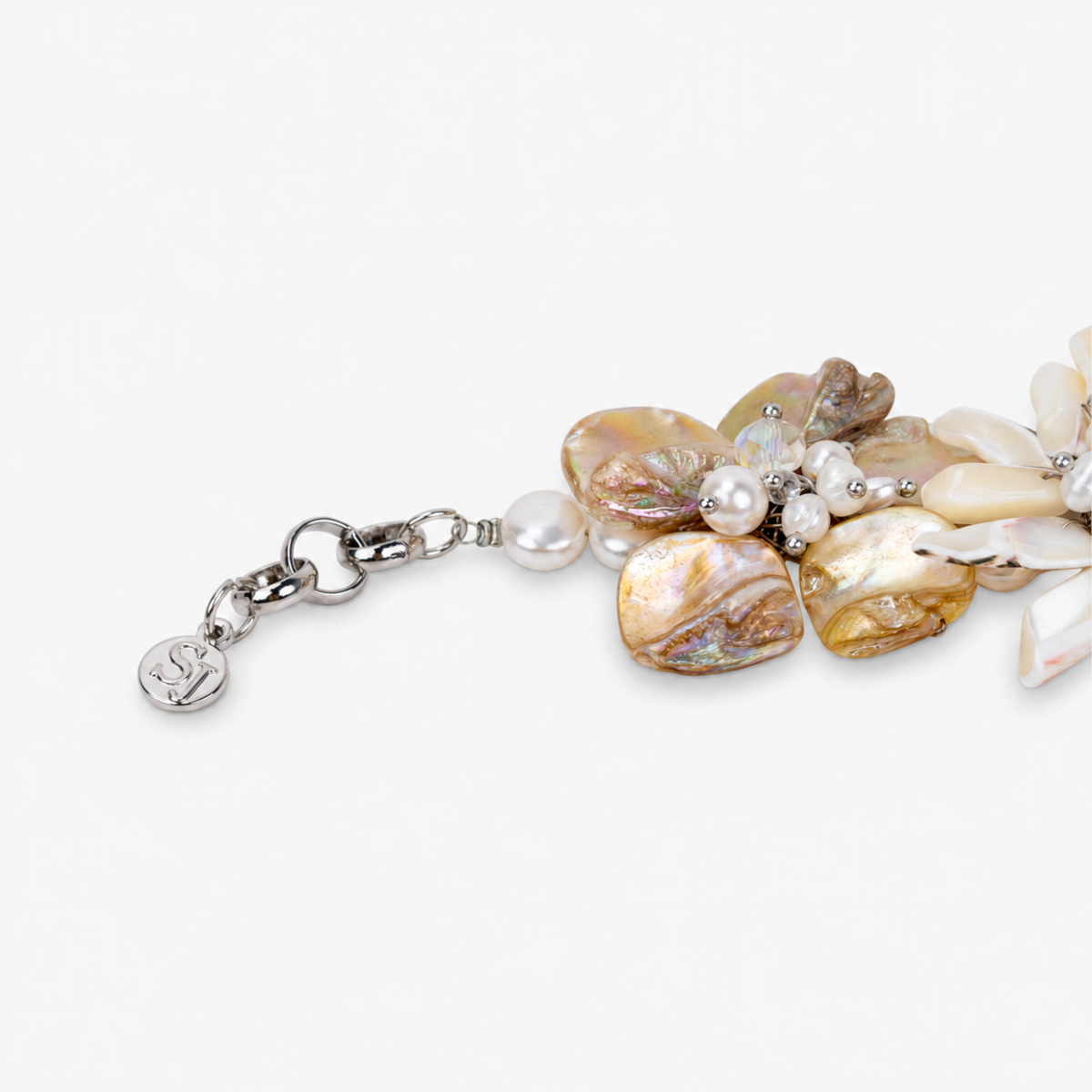 Sassy Jones Wisteria bracelet featuring handcrafted ivory shell flowers with freshwater cultured pearl details.