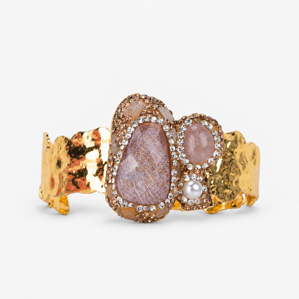 Zahara Adjustable Cuff in Rose featuring oversized dusty pink stones surrounded by sparkling crystal accents.