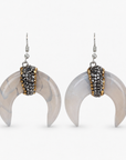 Zuma Natural Shell Crystal Crescent Dangles featuring marbled shell crescents and sparkling crystal centers.